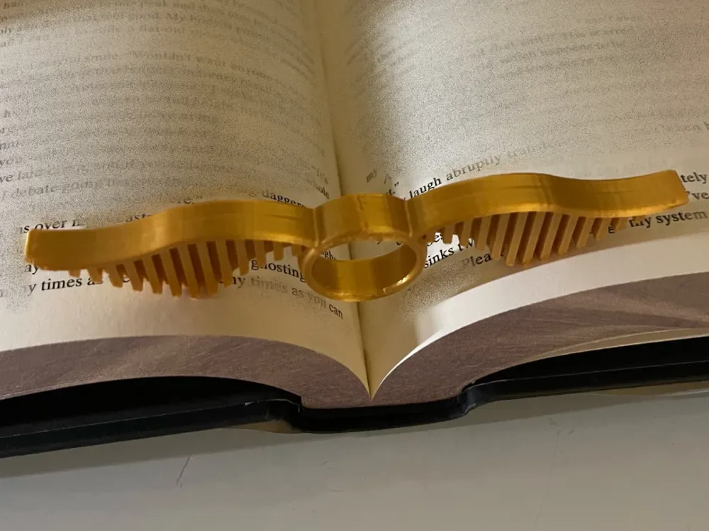 Porta libros con el pulgar del libro de la snitch de Harry Potter, vista 1