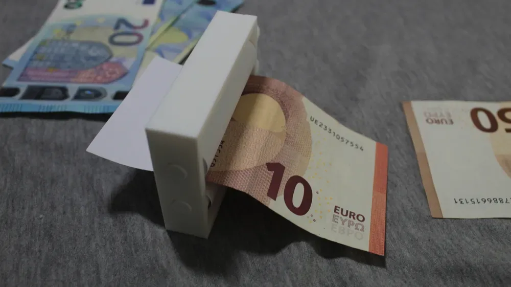 Impresora de dinero mágico, vista 3