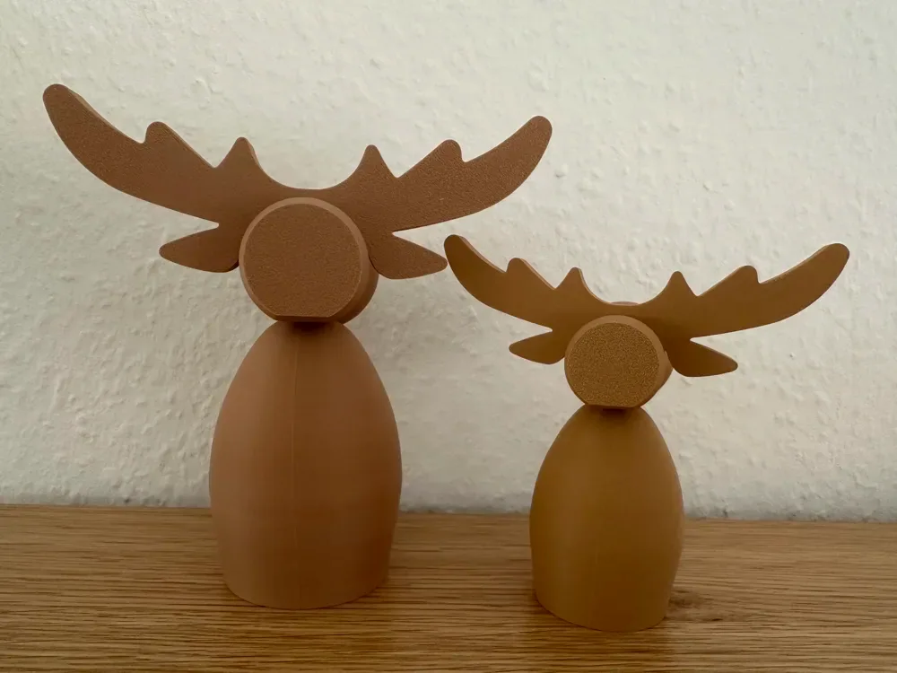Adorable familia de alces, vista 3