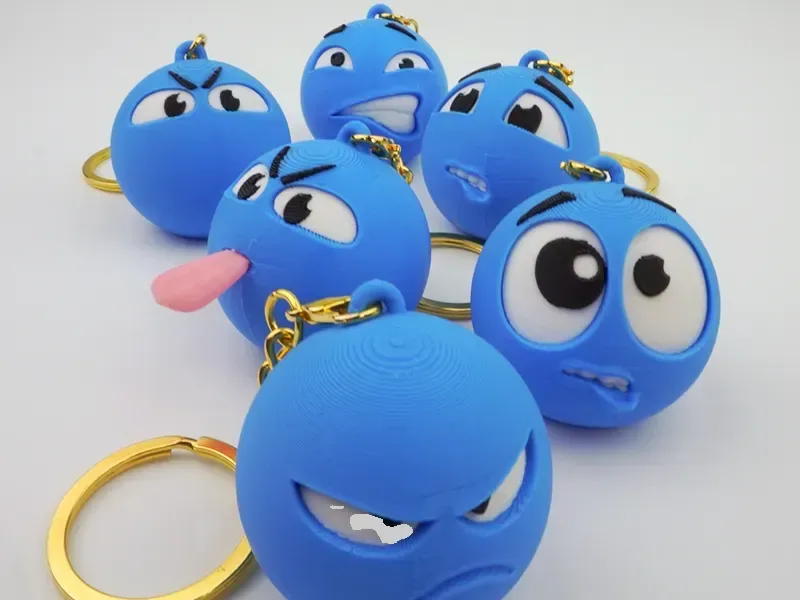 Llavero Emoji de cara azul pequeña, emoji de cara azul, emoji de frijol azul pequeño, vista 1