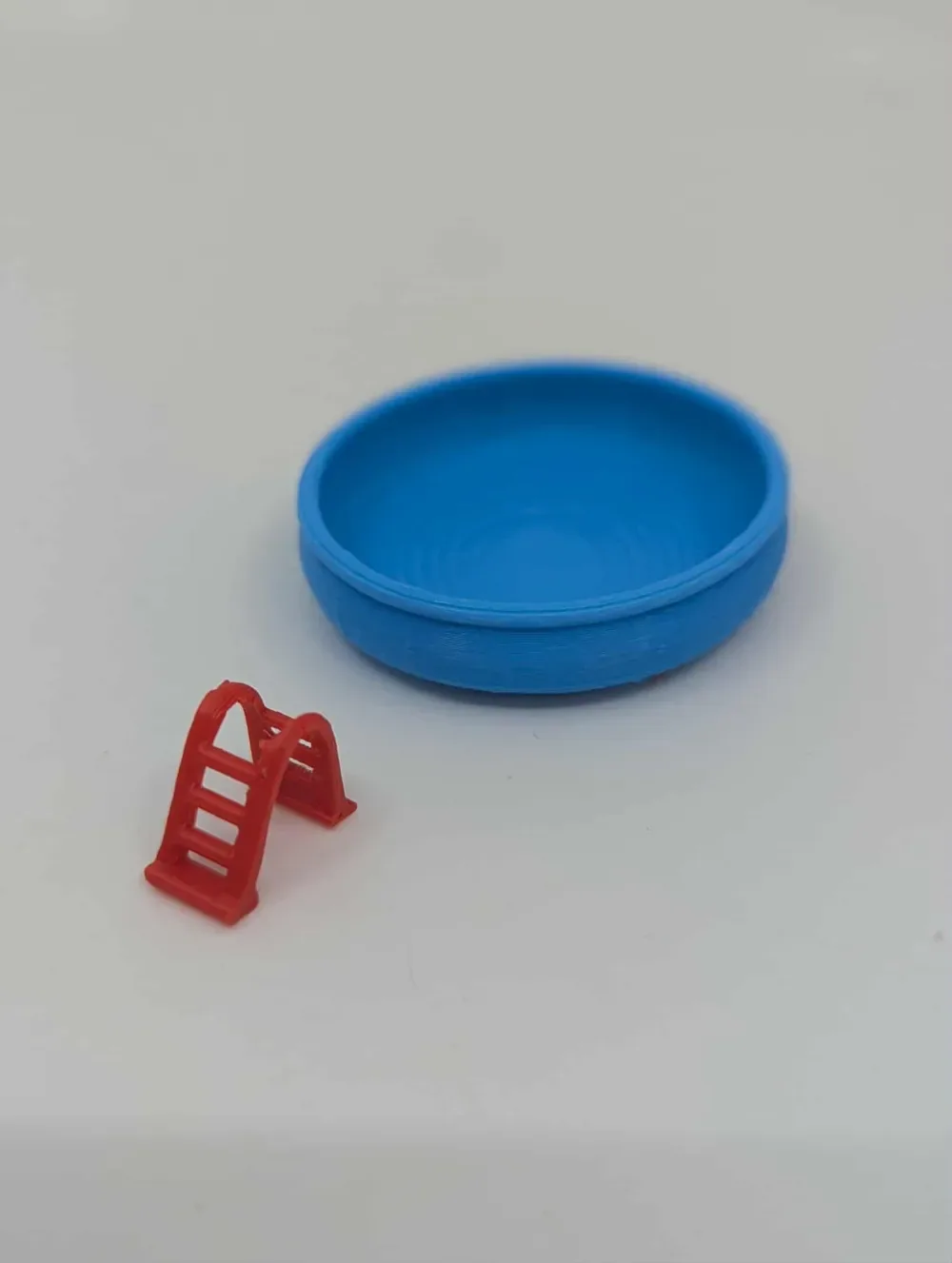 Cuenco de agua para reptiles sobre el suelo, plato para piscina infantil, vista 2