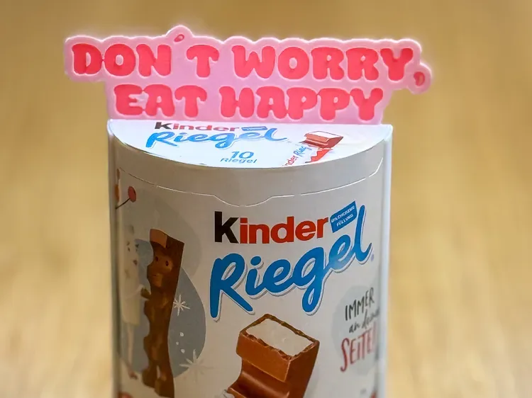 Marco de barra de chocolate Kinder: no te preocupes, come feliz, vista 1