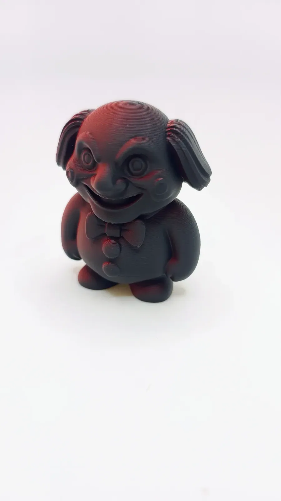 Payaso espeluznante de luz roja – sonrisa descarada, vista 2