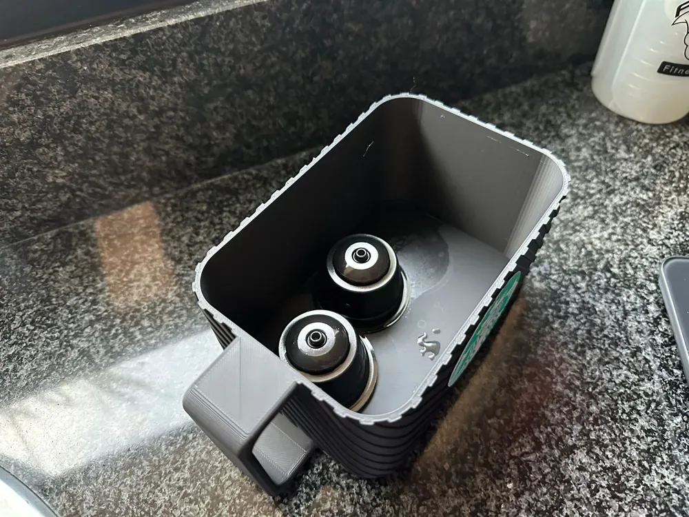 Envase de cápsulas de café usado para impresión 3D, vista 2