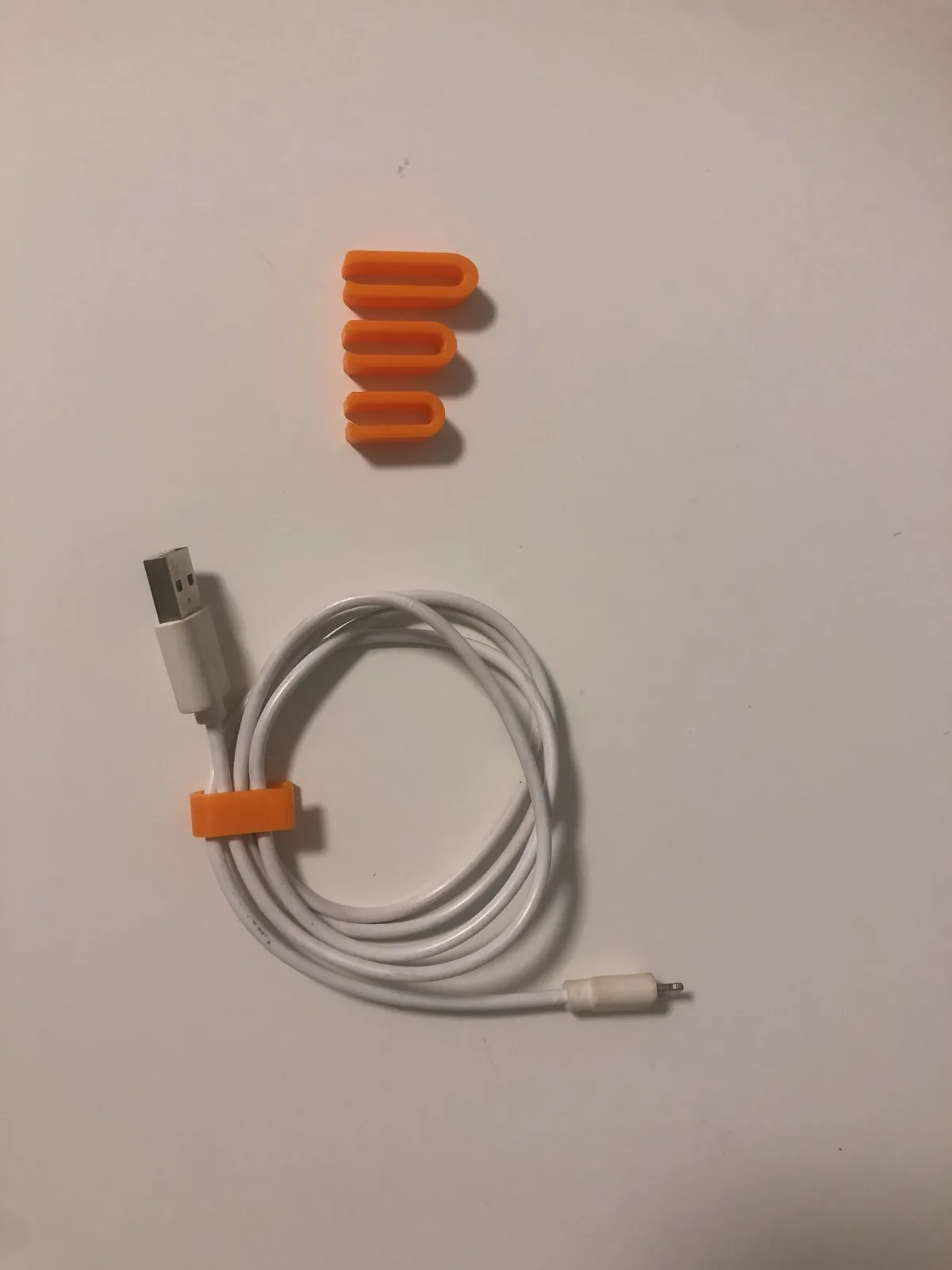 Clip organizador de cables para impresión 3D, vista 2