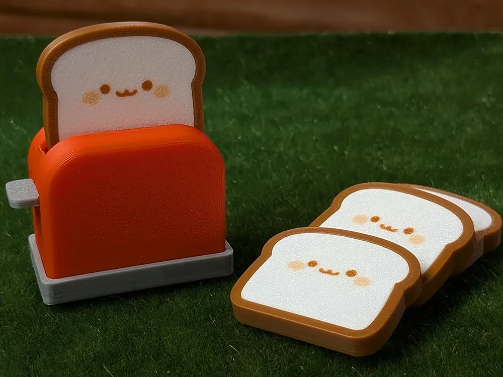 Lindo juguete antiestrés con clic para tostadas y tostadoras, vista 2