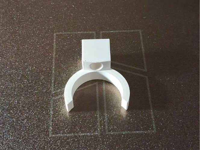 Soporte de pared para tubo de aspiradora para impresión 3D, vista 1
