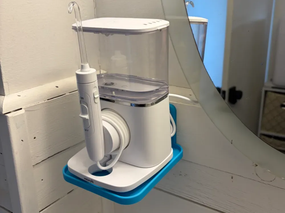 Soporte de pared para irrigador dental Waterpik Evolution, vista 1