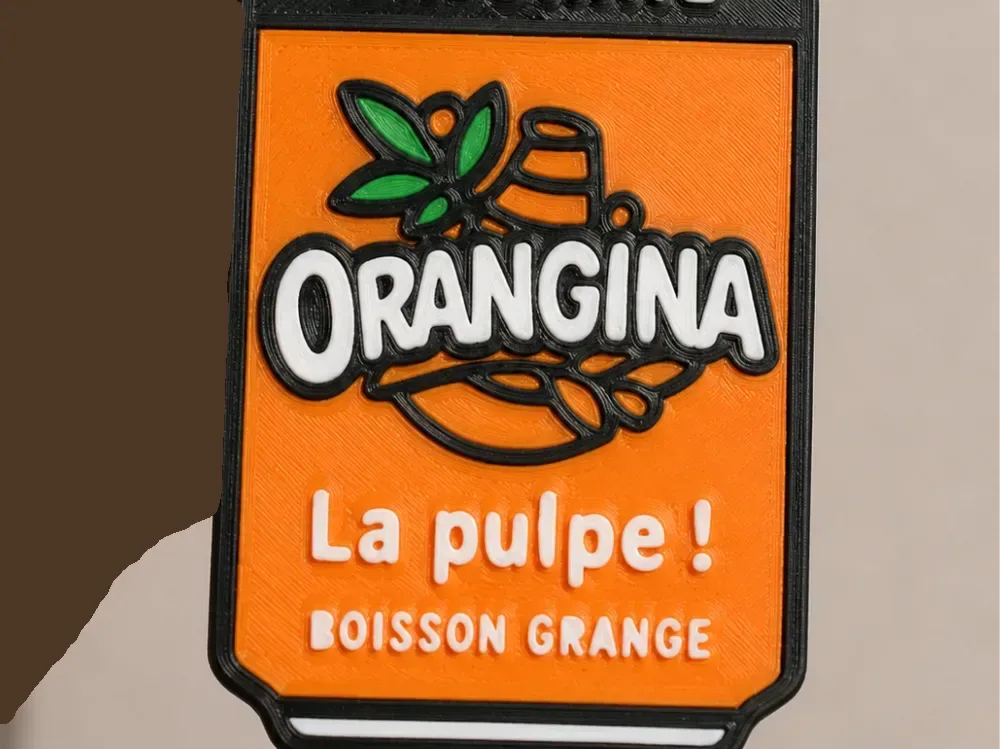 Llavero abridor de botellas de bebida Orangina, vista 1