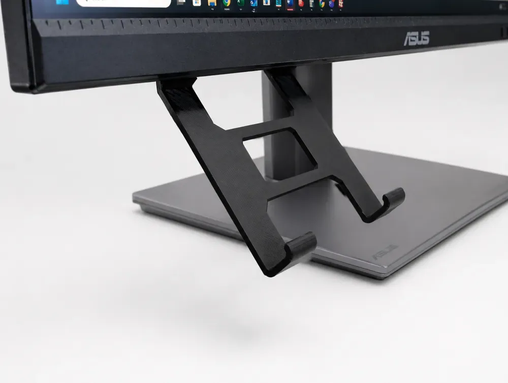 Soporte para teléfono debajo del monitor, vista 2