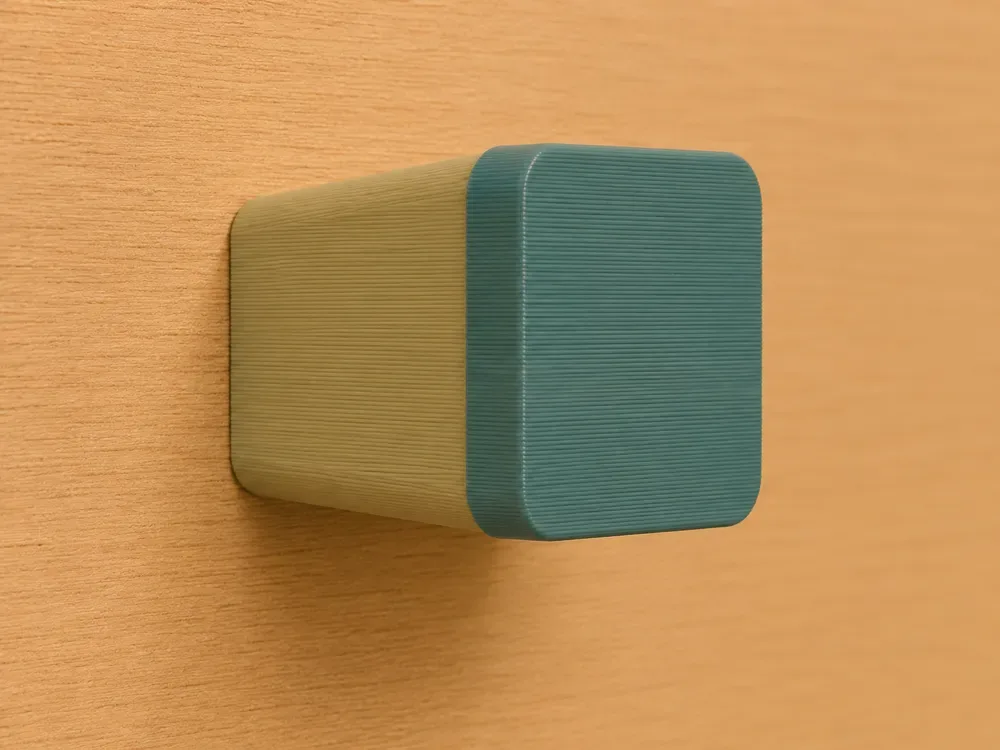 Soporte de pared con tapa de color para impresión 3D, vista 1