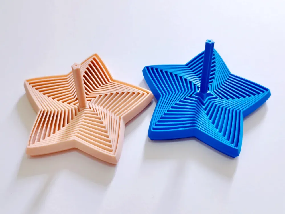 Juguete antiestrés con forma de torre de rábano y estrella de mar, vista 1