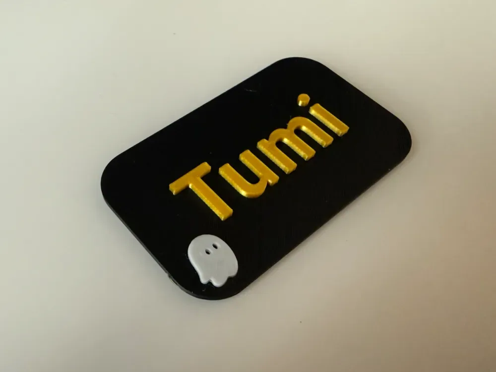 Etiqueta de nombre Tumi personalizable, con logo personalizado, vista 1