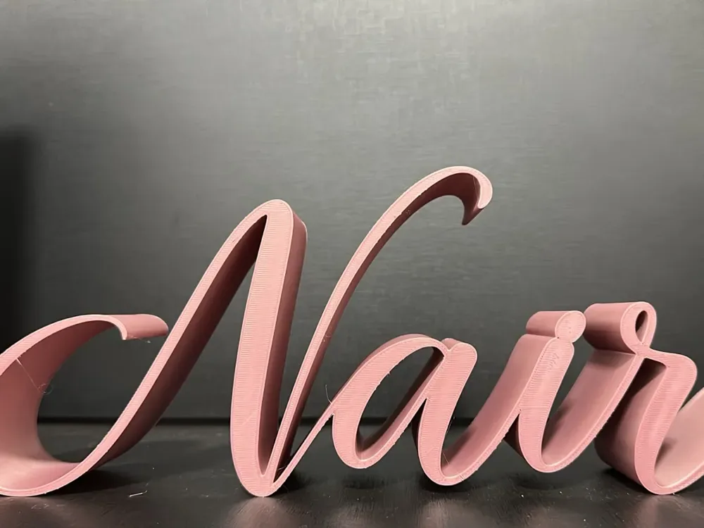 Signo de nombre cursivo de Nair – Nome Manuscrito, vista 1