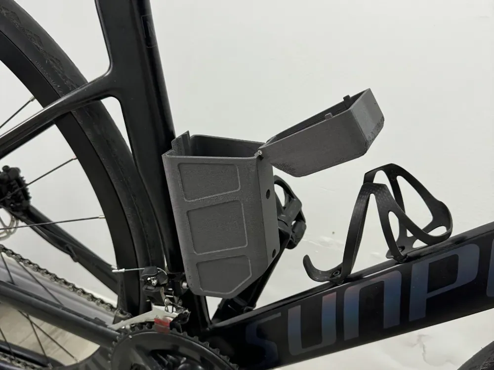 Caja de herramientas aerodinámicas para bicicletas de carretera y soporte para portabotellas., vista 1